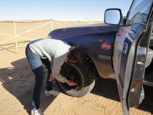 Benedicte Clarkson checking her car (Photo by Benedicte Clarkson for Morocco World News)