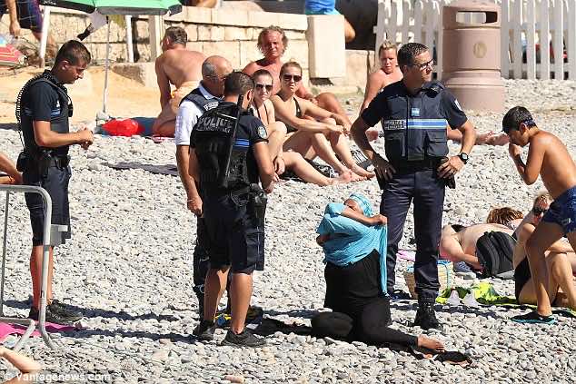 French Police Force Muslim Woman to Remove Her Swimwear on the Beach......