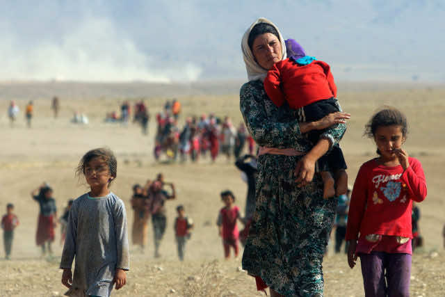 Yazidi women and girls are throwing themselves to their deaths from Mount Sinjar, to avoid being sold as sex slaves by militants, according to witnesses. Reuters