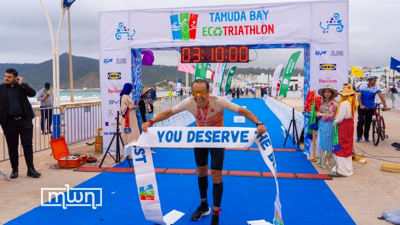 Nabil Bouzoubaa crossing the finish line