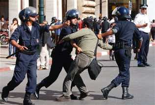 Young Moroccans protest, defying government ban