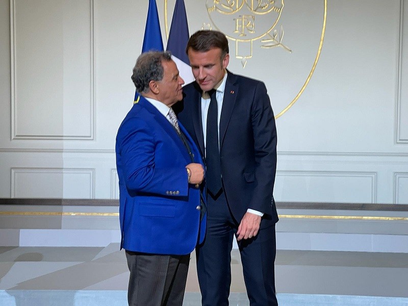 Mehdi Qotba and French President Emmanuel Macron