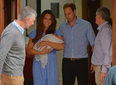 Britain’s William and Kate emerge with baby