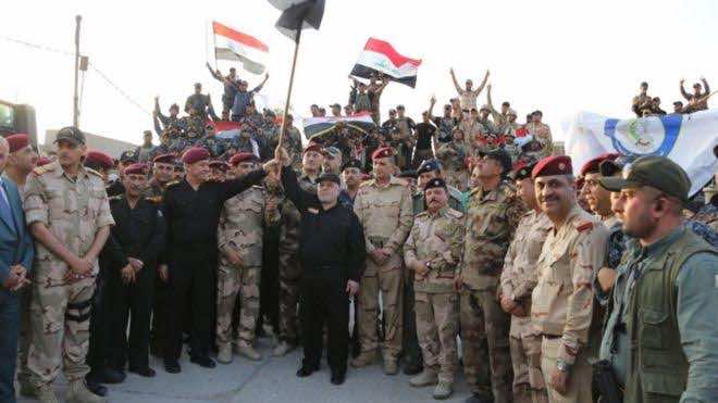 Iraqi Flag Flies Once More Over Mosul After “Total Victory” Declared