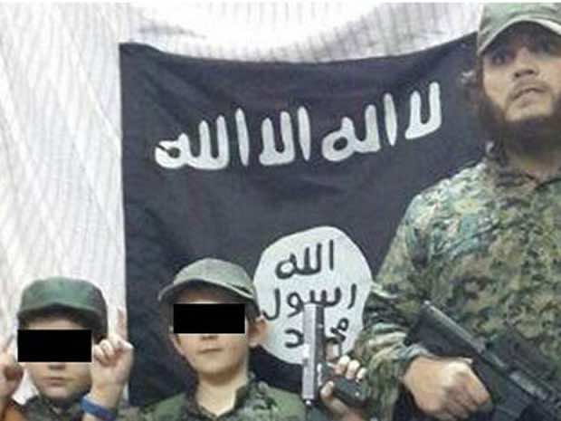 Son of Australia’s Most wanted Terrorist Holds Decapitated Head Before Camera