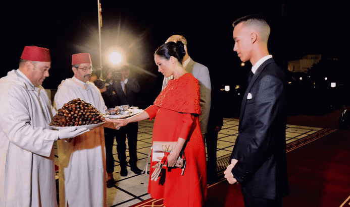 Pregnant Duchess Meghan Markle Wears Red Dress to Honor Morocco