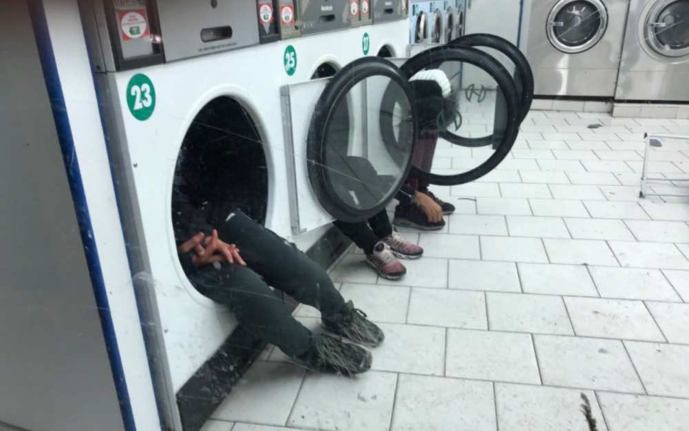 Paris: Seeking Shelter from the Cold, Moroccan Teenagers Sleep in Washing Machines