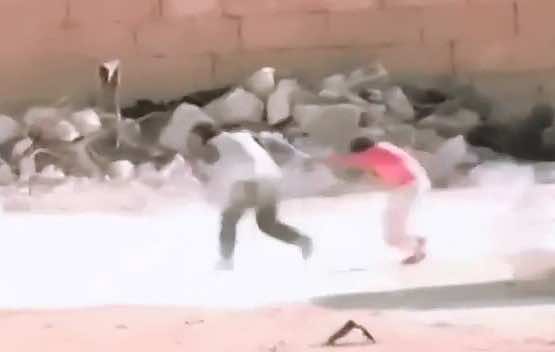 Syrian Child Saves His Sister Under Heavy Gunfire