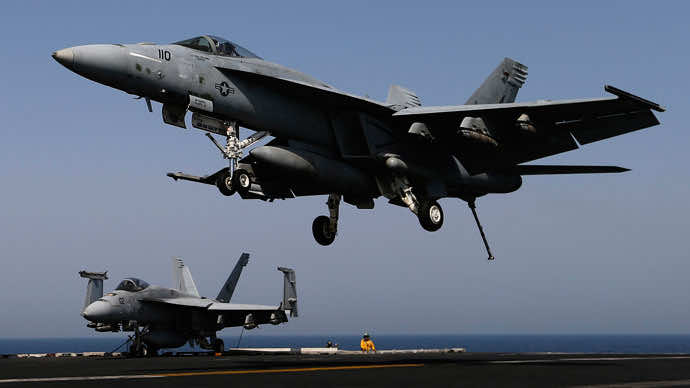 US-led Coalition Launches First Airstrikes on ISIS