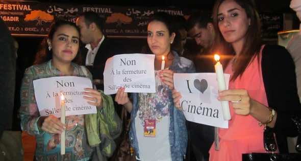 Agadir: Silent candle-lit standing protest mourning cinemas