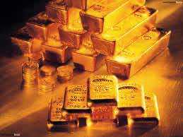 Gold prices near 3-year low on strong U.S. economic data