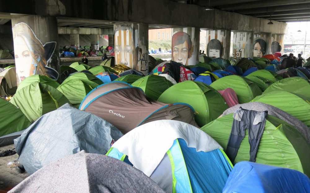 French Police Remove 1,016 Migrants from Paris Camp