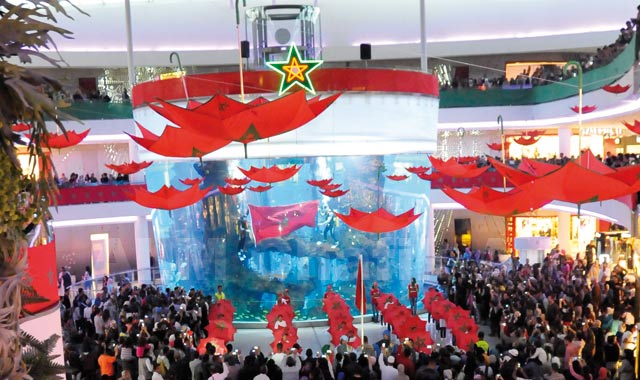 Thousands Wave Moroccan Flag at Morocco Mall in Casablanca