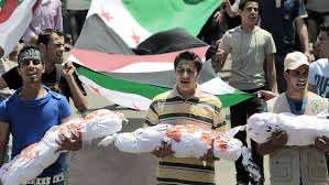 1600 victims and Assad allies celebrate the massacre