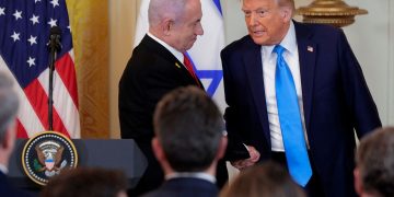 President Donald Trump and Israeli Prime Minister Benjamin Netanyahu shake hands following a joint news conference at the White House. Photo credit: Chip Somodevilla