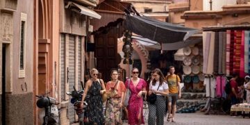 Tourists walk in old city of Morocco's Marrakesh