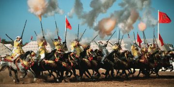 Ancient Moroccan horse tradition dazzles Qatar in ceremonial performance.
