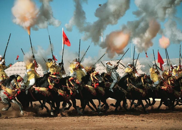 Ancient Moroccan horse tradition dazzles Qatar in ceremonial performance.