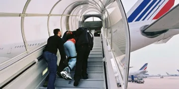 France expels long-term Moroccan resident under new immigration law.