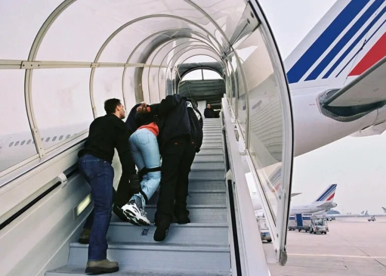 France expels long-term Moroccan resident under new immigration law.