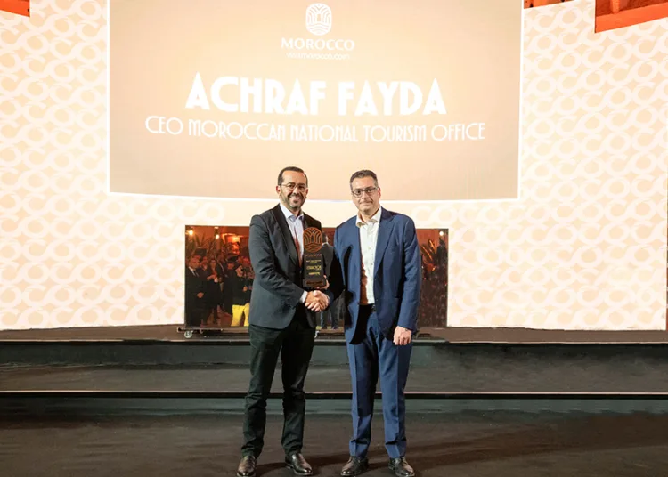 ONMT’s director general Achraf Fayda receiving the award from WTG president
