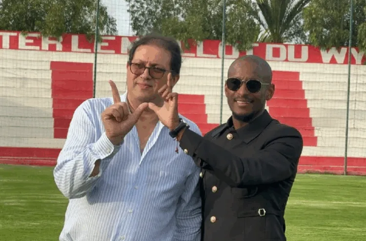 Wydad's president Hicham Aït Menna (on the left) appointed Rhulani Mokwena as club's head coach last summer.