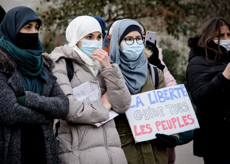 Demonstrators wearing hijab protest against the bill on separatism in Paris, on Feb. 14, 2021.Jacopo Landi—Hans Lucas/Reuters