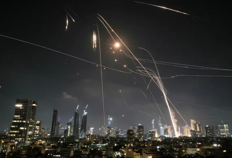 Israeli Iron Dome air defence system fires to intercept missiles over Tel Aviv, Israel [Leo Correa/AP Photo]