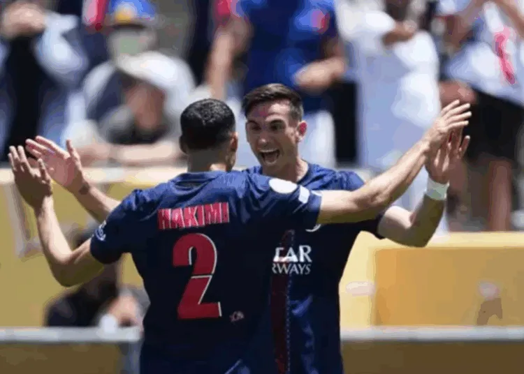 Achraf Hakimi is celebrating with Fabian Ruiz after scoring PSG's first goal.