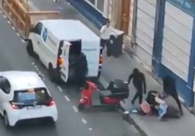 Image from the footage showing the kidnapping attempt of the daughter and grandson of the CEO of a cryptocurrency companycin Paris