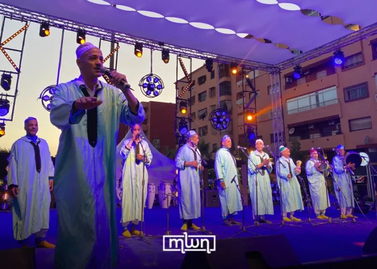 Day 2 of the 54th Festival National des Arts Populaires picked up where the night before left off, but this time, the celebration split into two parallel beats. At Place El Guerguerate Hay Massira, a new stage welcomed an equally electrified crowd. 