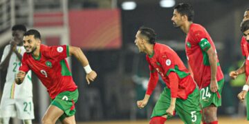 Moroccan players celebrating after their win against Senegal in CHAN 2024 semifinals