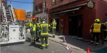The blast tore the doors from their hinges and sent glass fragments flying into the street.