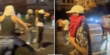 Responding to social media calls, dozens of youth – some wearing masks – gathered on the highway.