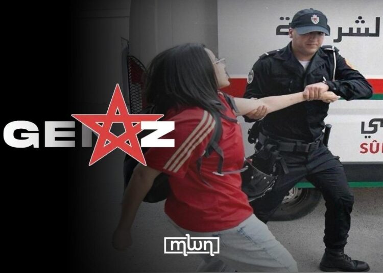 A police man dragging a female protester during a Gen Z demonstration