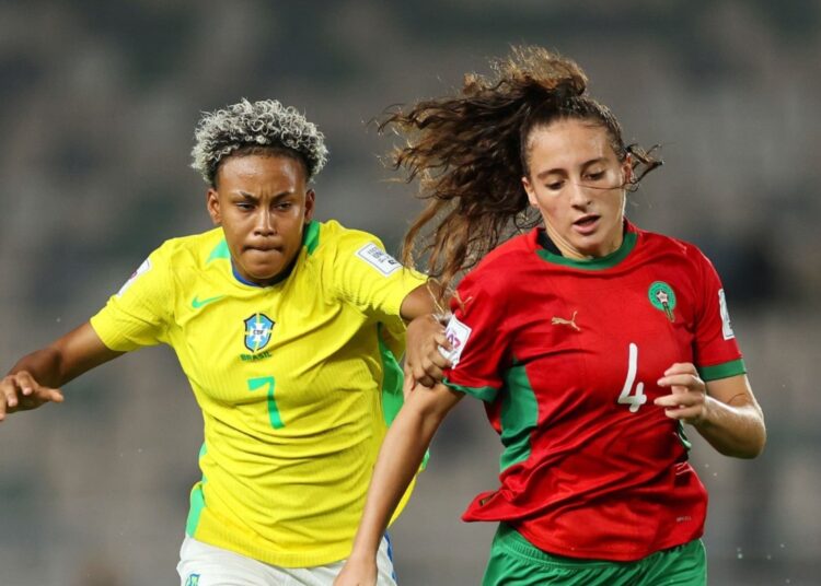 A Morocco and a Brazil player during their U17 World Cup game