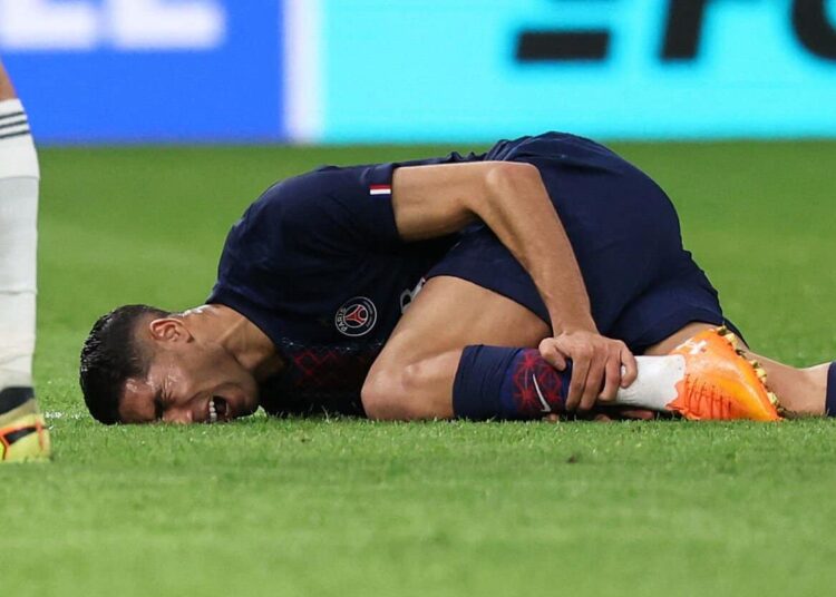 Hakimi, visibly in extreme pain, was unable to put weight on his left foot as medical staff helped him off the field.