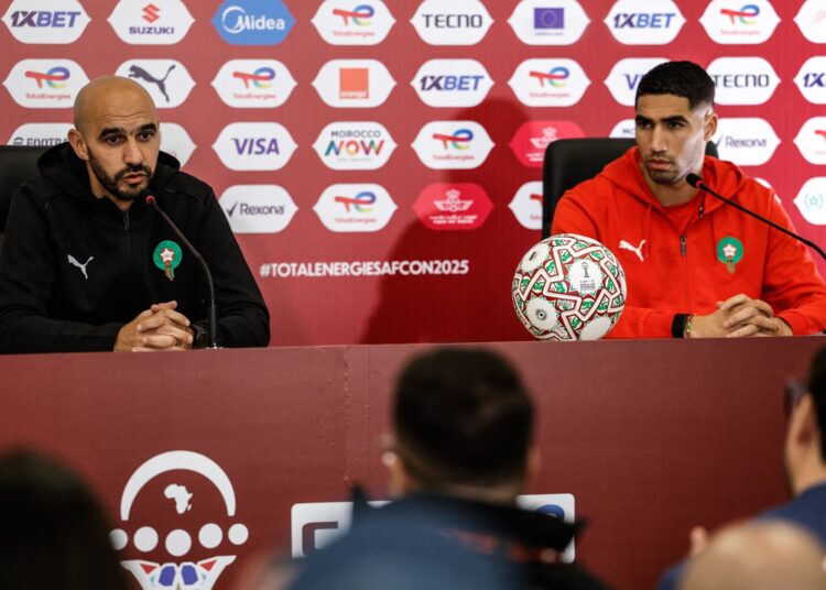 Morocco captain Achraf Hakimi and coach Walid Regragui at Saturday’s pre-match press conference.