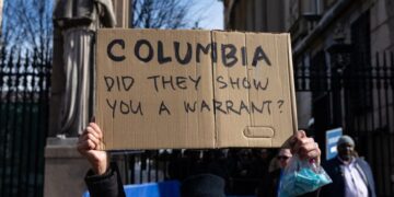 Protesters hold an anti-ICE rally outside Columbia University after federal agents detained a student Thursday. Mostafa Bassim/Anadolu/Getty Images)