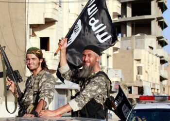Islamic State of Iraq and Syria (also known as ISIL - Islamic State of Iraq and the Levant, or IS - Islamic State) is a transnational Salafi jihadist militant group and former unrecognized proto-state that originated in Iraq and Syria, aiming to establish a worldwide caliphate.