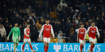 Arsenal’s title hopes took another hit at Molineux. The chants of “second again, ole, ole” rang out from Wolverhampton Wanderers fans