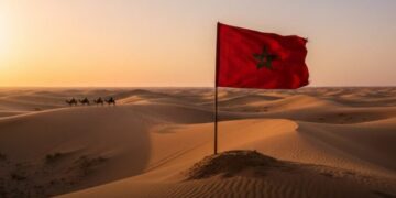 Moroccan flag in the Sahara desert.