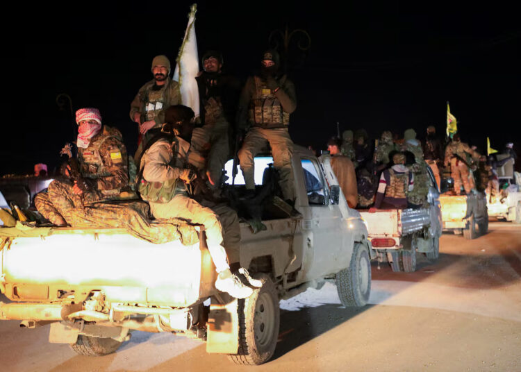 Syrian Democratic Forces vehicles withdraw from the front lines following an agreement between the Syrian government and the Syrian Democratic Forces, in Hasakah, Syria February 10, 2026. REUTERS/Orhan Qereman/File Photo