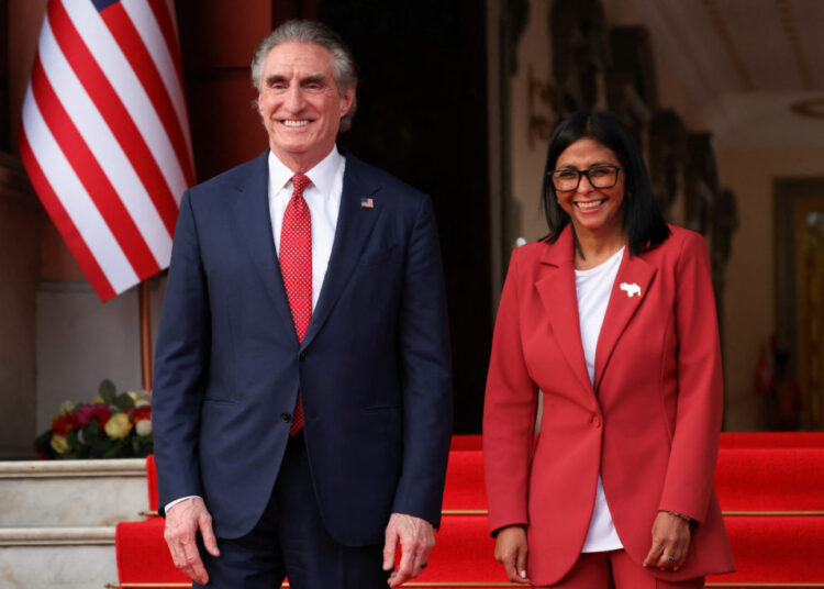 Venezuela’s interim President Delcy Rodriguez and US Interior Secretary Doug Burgum stand together as they attend to deliver statements at Miraflores Palace, in Caracas, Venezuela, March 4, 2026. Photo by Leonardo Fernandez Viloria/Reuters