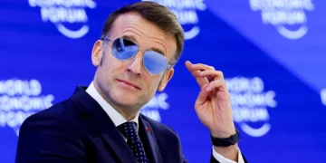 Observers note that Macron has carved out a stronger international profile, particularly after his Davos appearance in January, where his sunglasses and repeated “For sure” catchphrase went viral on social media.