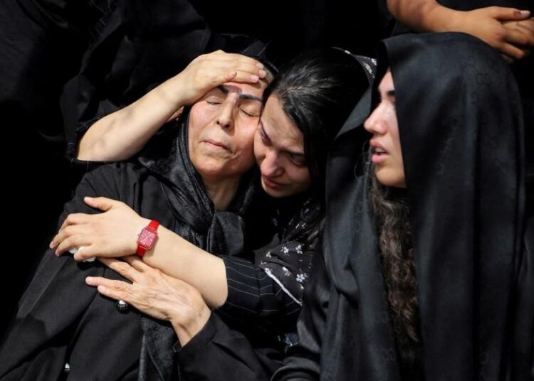 Women grieve at a funeral for school strike victims, who were mostly girls aged seven to 12. (Reuters: WANA/Amirhossein Khorgooei/ISNA)