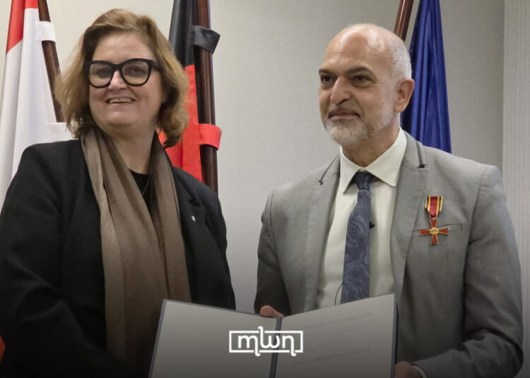 Sehouli being recognized by Ina Czyborra, the German senator for science, health and care