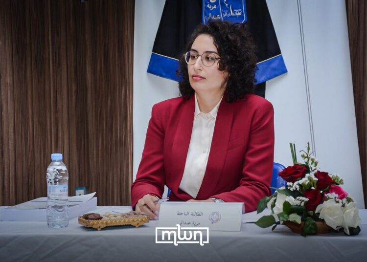 Maria Abdali presenting her thesis.