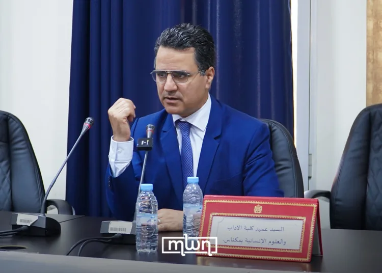 Samir Bennis speaks before a packed hall at Moulay Ismail University on Tuesday during an intellectual forum convened to discuss his latest works.