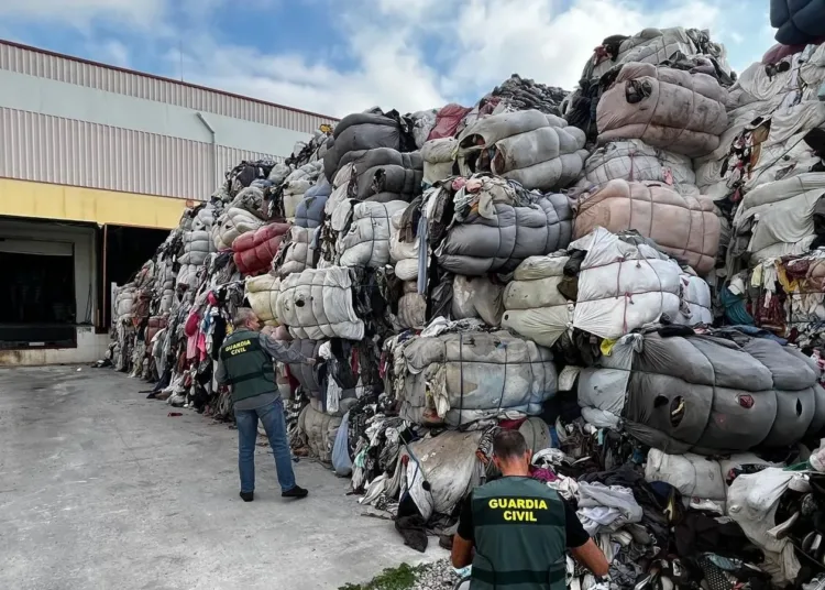 Two men and two companies will stand trial in Spain over the alleged illegal import of large volumes of used clothing and textile waste brought from Morocco.
